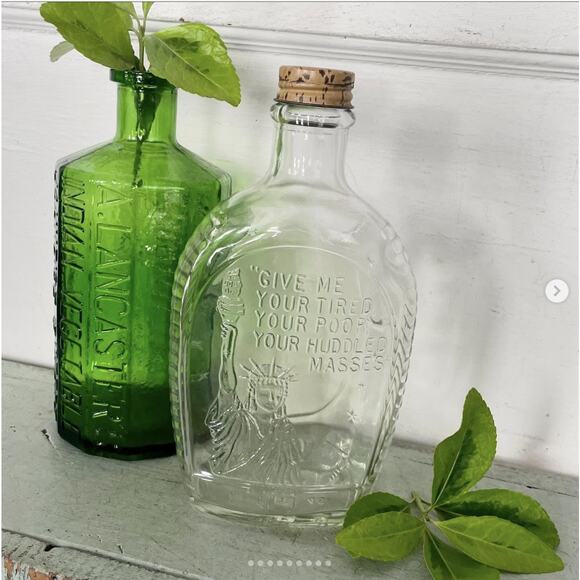 Vintage Embossed Glass Log Cabin Bottle Statue Liberty Tired Poor Huddled Masses - Picture 1 of 9